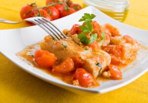Fischfilet mit Tomaten und Paprika