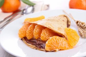 Crêpe mit Mandarine und Schokocreme